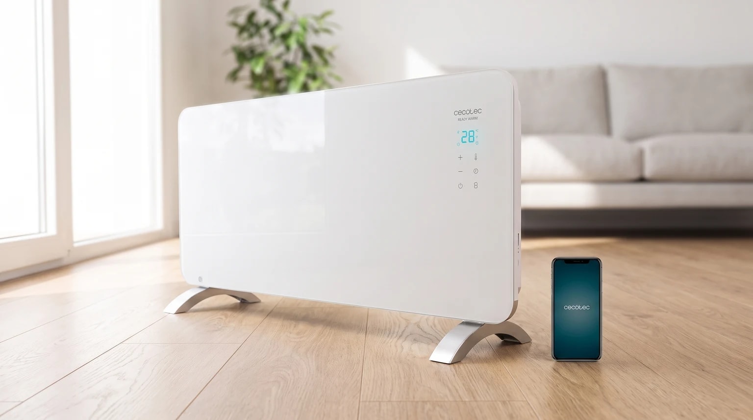 Convector Cecotec branco com painel de vidro numa sala luminosa, ao lado de um telemóvel para controlo remoto.